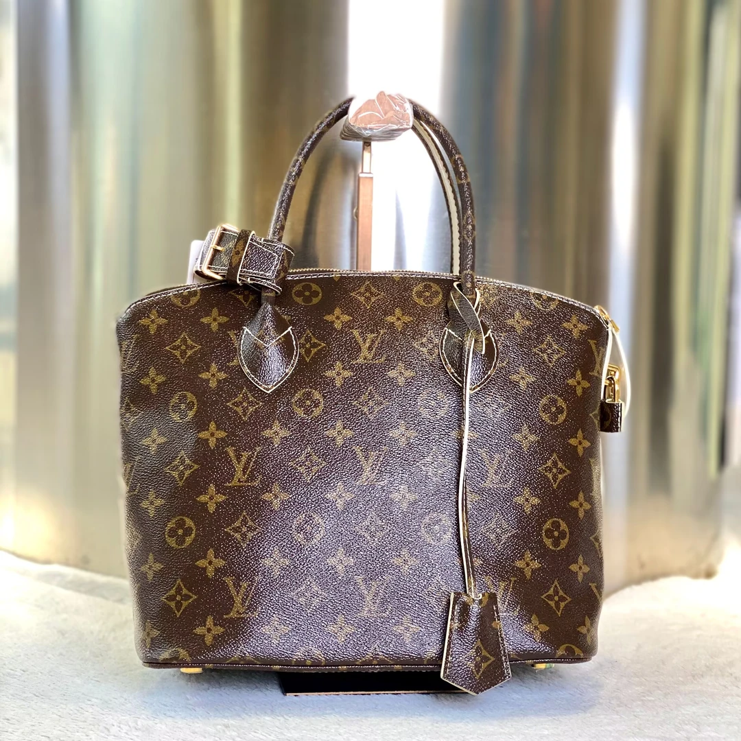 99新 LouisVuitton/路易威登 爱马98新LV贝壳手提包9424