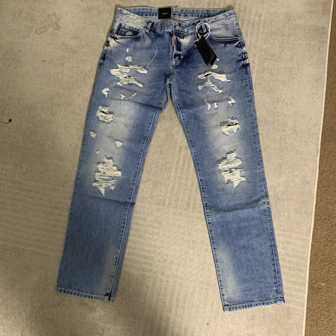 未使用 YSL/圣罗兰 D2 铆钉内衬破洞水洗牛仔裤全尺码 42635
