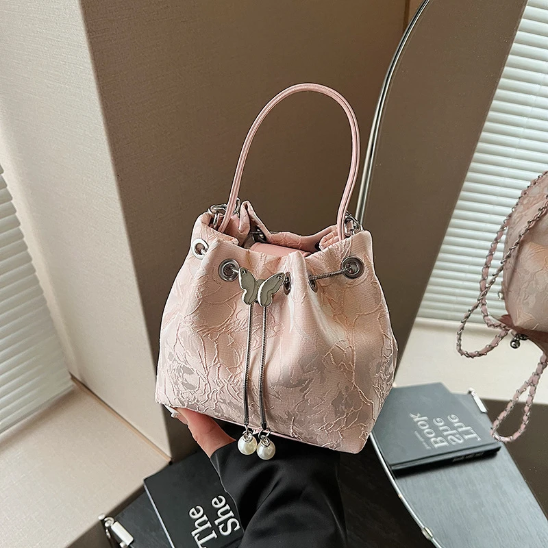 国风压花水桶包新款抽绳小众设计女士单肩包游玩百搭链条斜挎包