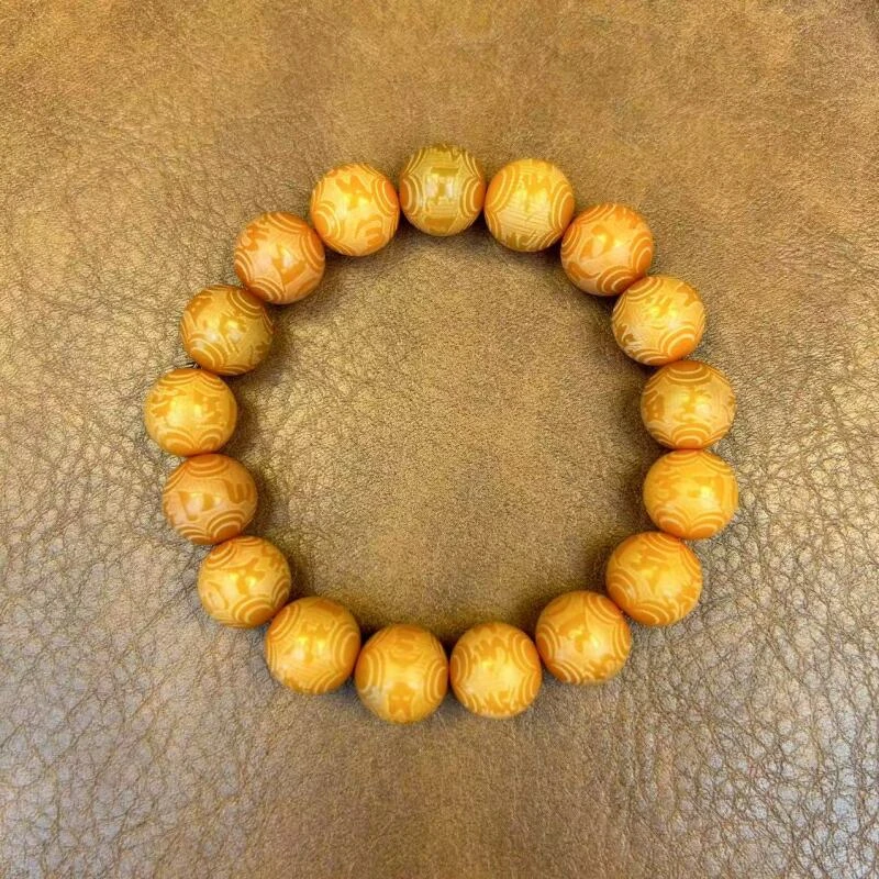 A63 雕刻黄菩提手串