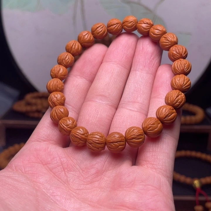 桃核手串9.5玉龙脊手串