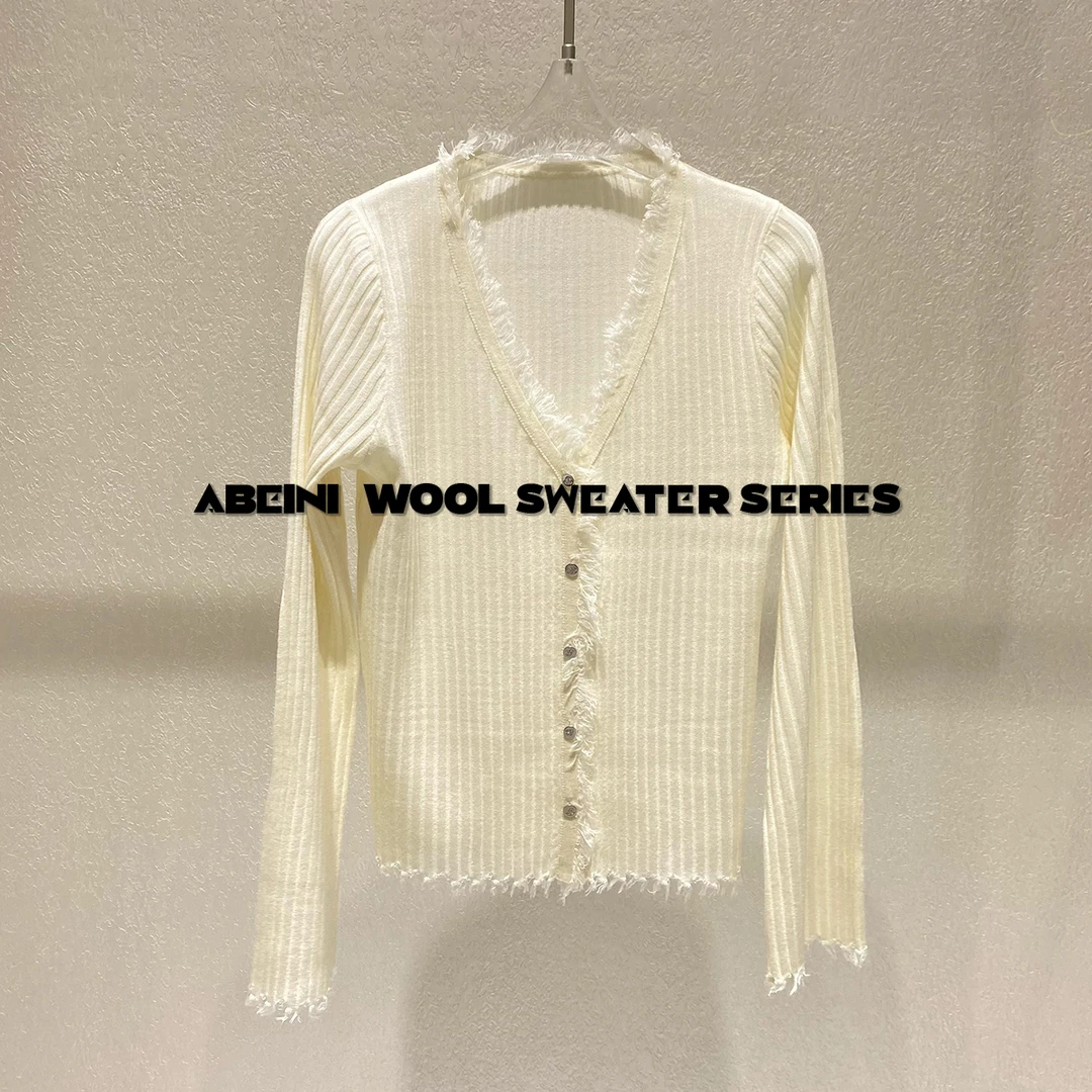 春日新款桑蚕丝简约气质千金感流苏袖羊毛衫上衣女