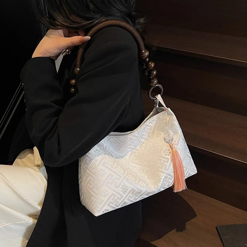 广西壮锦风帆布包女大容量2025新款小众单肩腋下包休闲上班通勤包