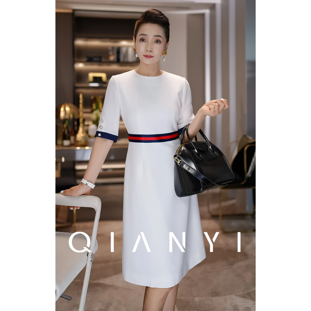 纤屹2025气质百搭通勤静奢高级撞色显瘦女装连衣裙纤屹女装