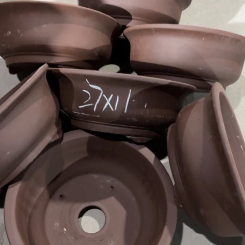 100-7。       27-11