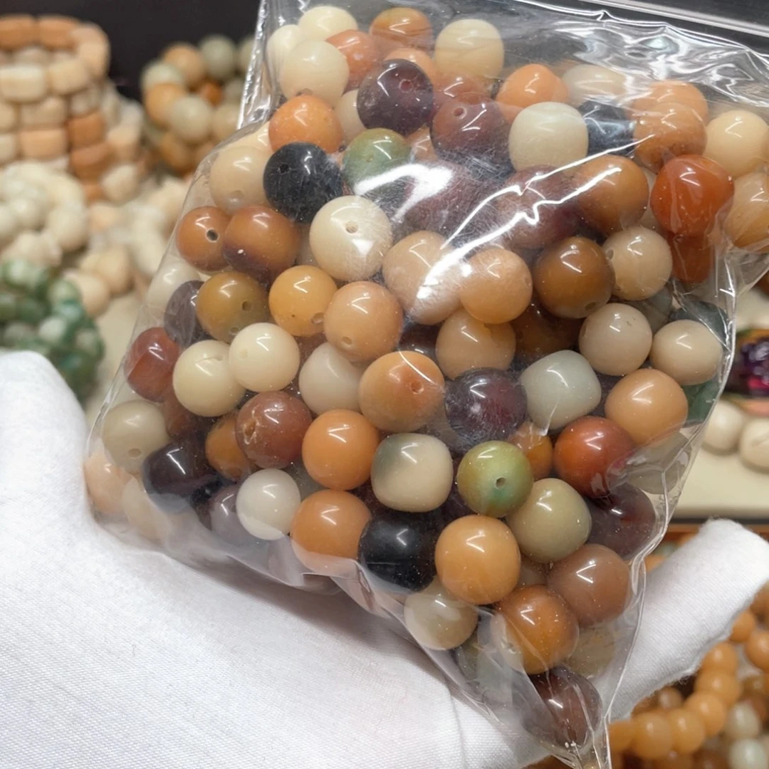 菩提根/象牙果吊坠瑕疵水磨混珠200颗