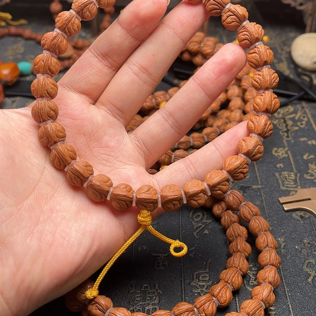 桃核吊坠玉龙手持