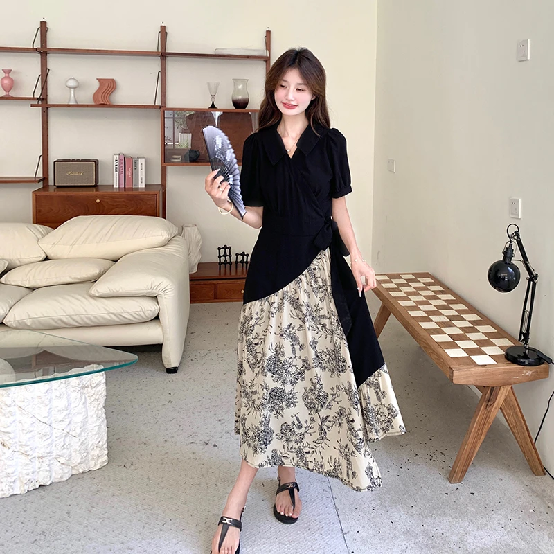 碎花拼接V领黑色连衣裙女夏季2025今年流行爆款收腰显瘦a字长裙子