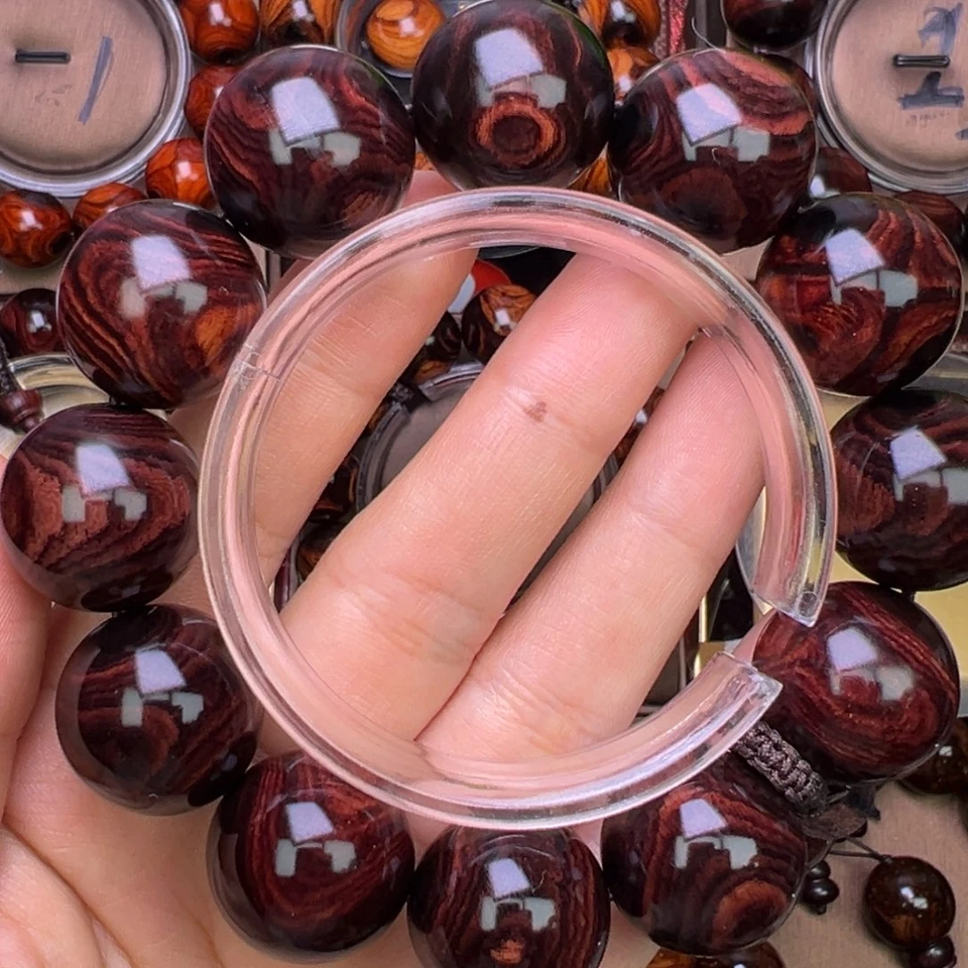 木质类黄花梨鬼脸对眼成品手串