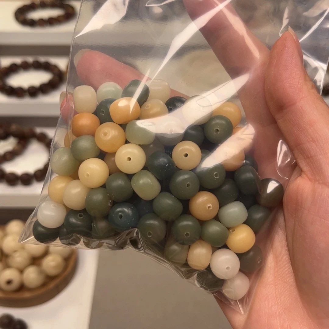 麦***麦白玉菩提吊坠阴皮子桶珠100颗