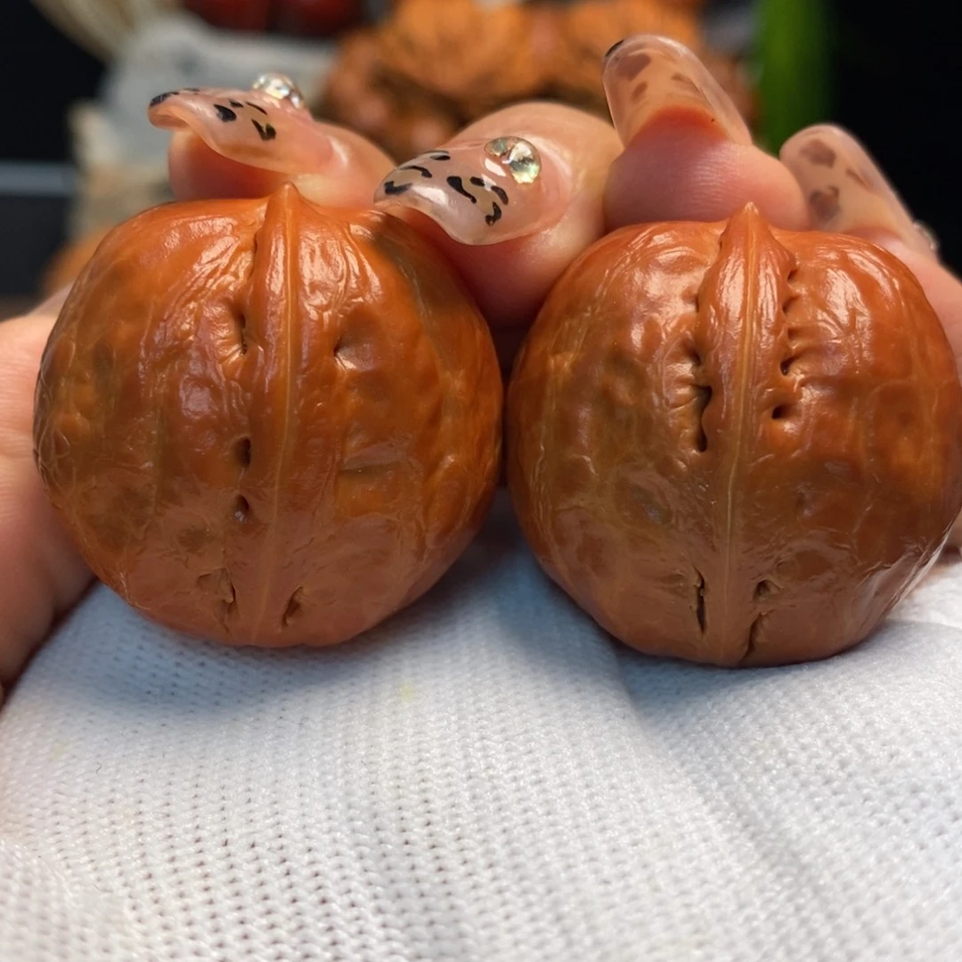 文玩核桃把件龙胆元宝