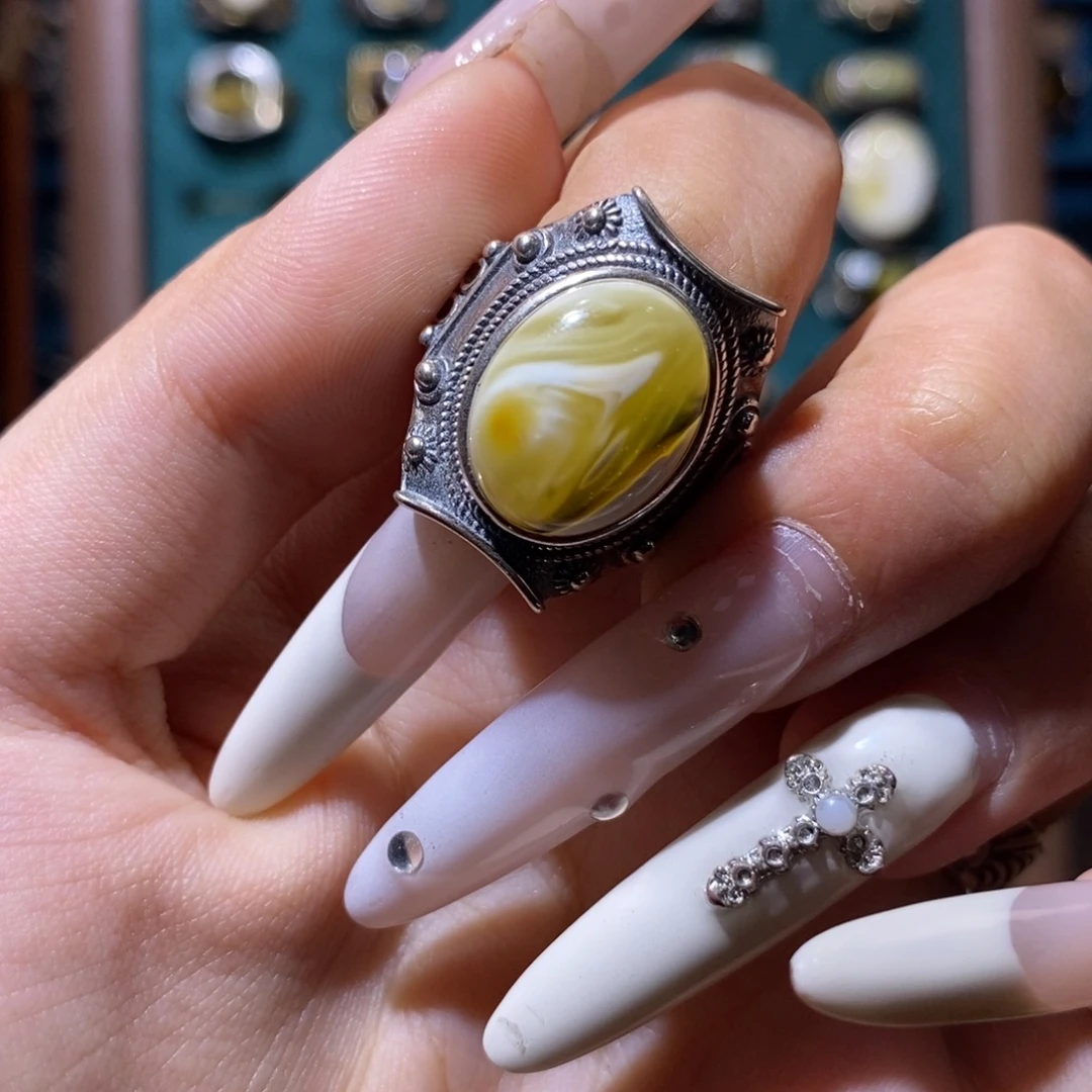 蔡***折琥珀银S925镶嵌戒指