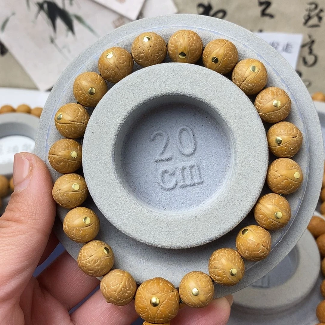 吊坠凤眼菩提12.5铜手串