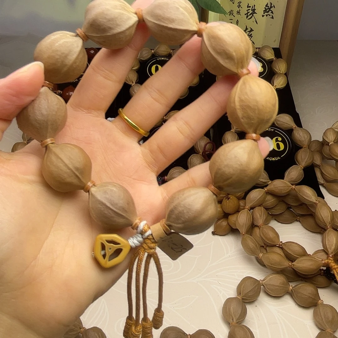哥***说手串橄榄核梅林铁核20*25