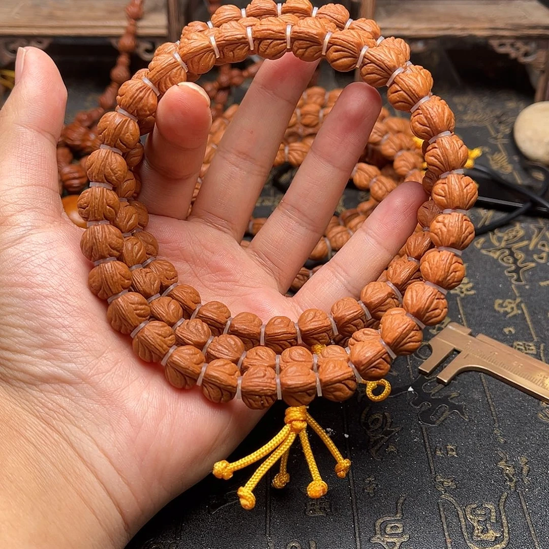 桃核吊坠玉龙手持