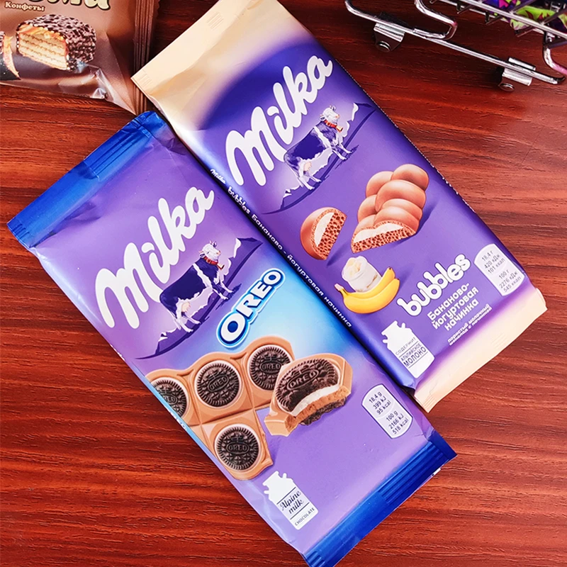 妙卡Milka俄罗斯德国进口巧克力气泡奥利奥夹心巧克力榛仁草莓味