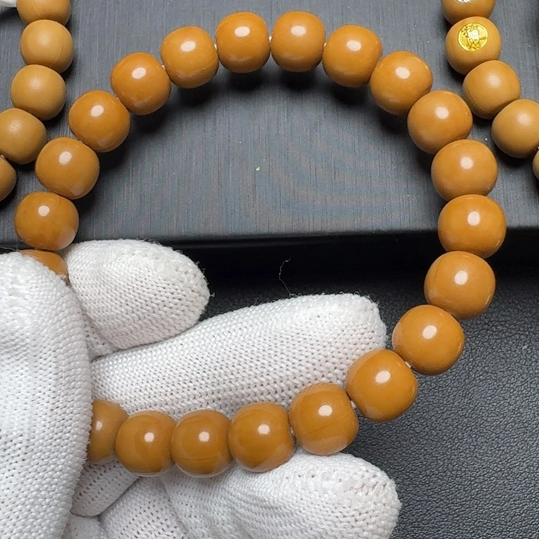 凡***客猴头核桃手串4标，舍得卍字