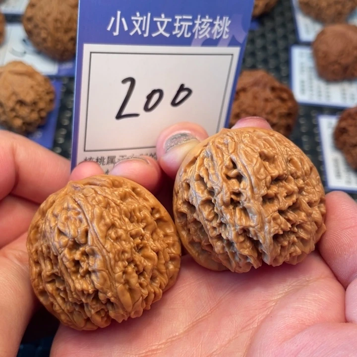 桃核把件40南疆石200。。。