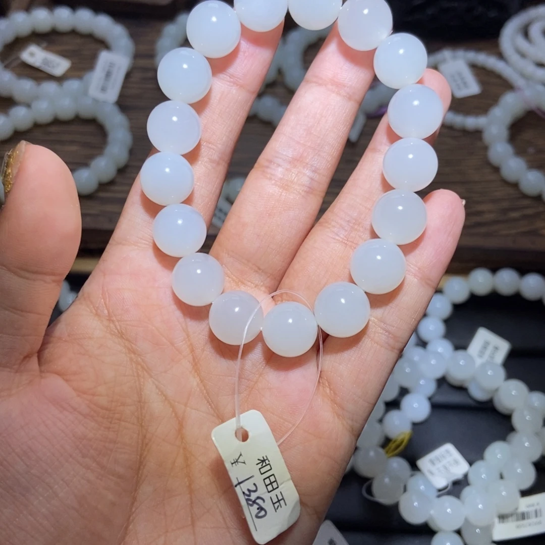 夏***晴未镶嵌手串和田玉圆珠卡12青海