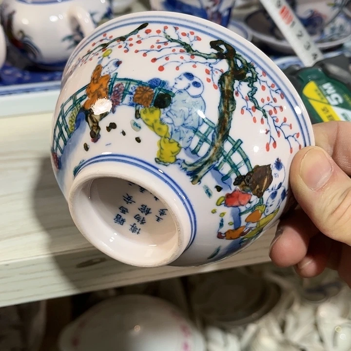 瓷片///////直径12.5厘米。红西西。