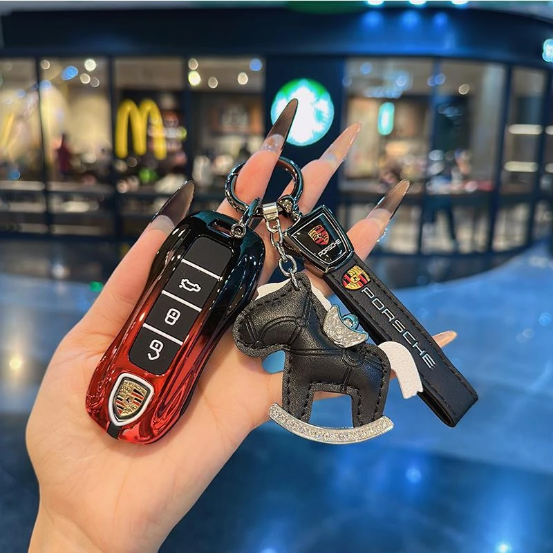 适用保时捷钥匙壳帕拉梅拉macan卡宴718扣911taycan套高档金属