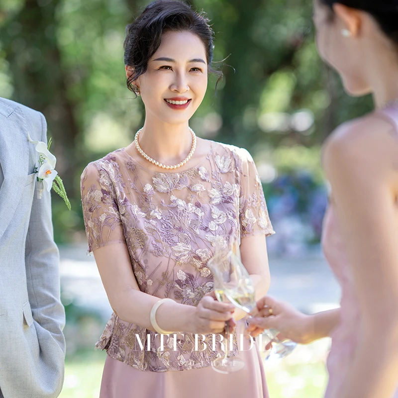 满庭芳华喜妈妈礼服喜婆婆婚宴装2025新款年轻气质高级感连衣裙夏