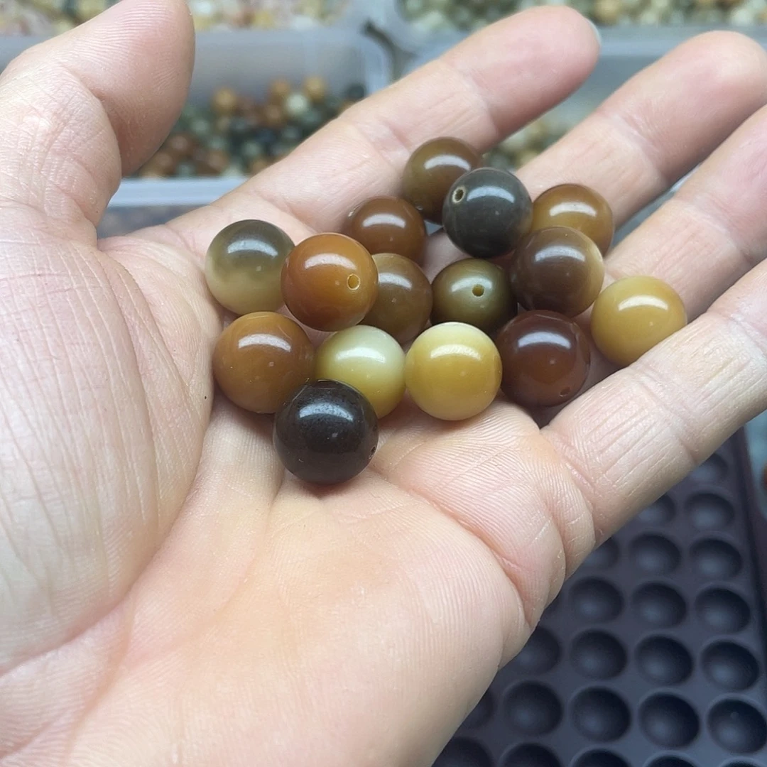 白玉菩提吊坠14微瑕焦糖圆65颗