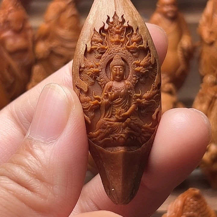T***解橄榄核吊坠橄榄核