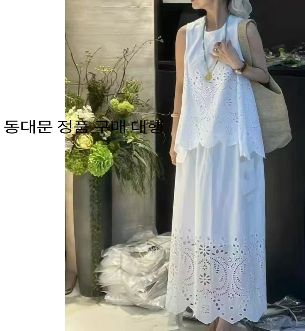 （Xi西里镂空套装）无袖花朵镂空背心+重工刺绣镂空半裙两件套C762