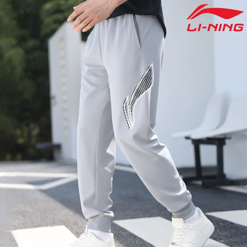 李宁卫裤运动裤男士2025春秋季新款束脚针织印花裤子跑步长裤宽松
