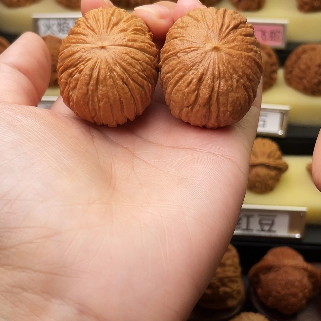 肖***兴文玩核桃吊坠猴头元宝40尺650