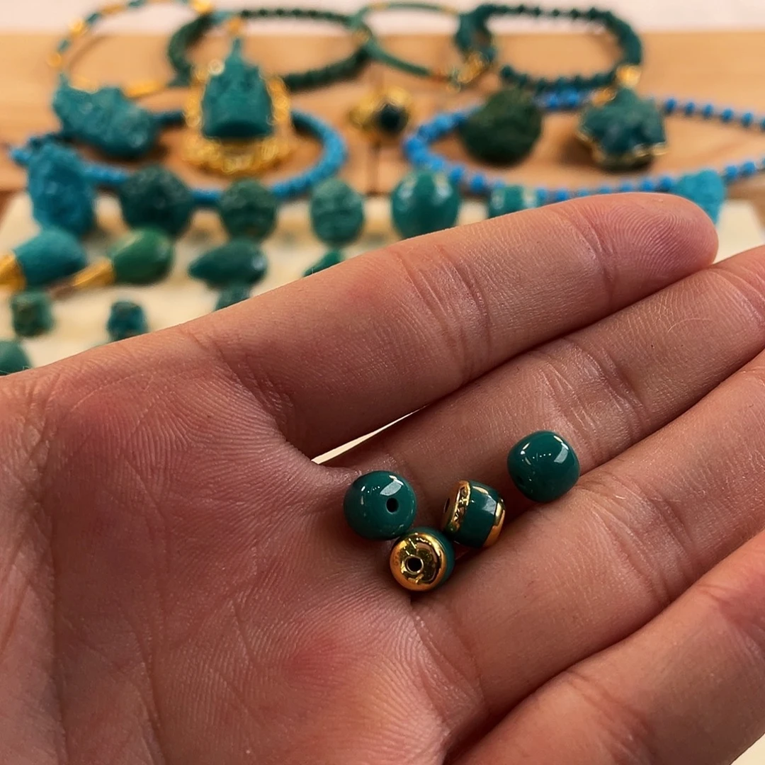 骑***灯绿松石未镶嵌挂件