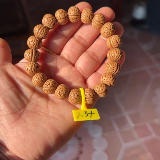 ـ***业木质野生桃核手串