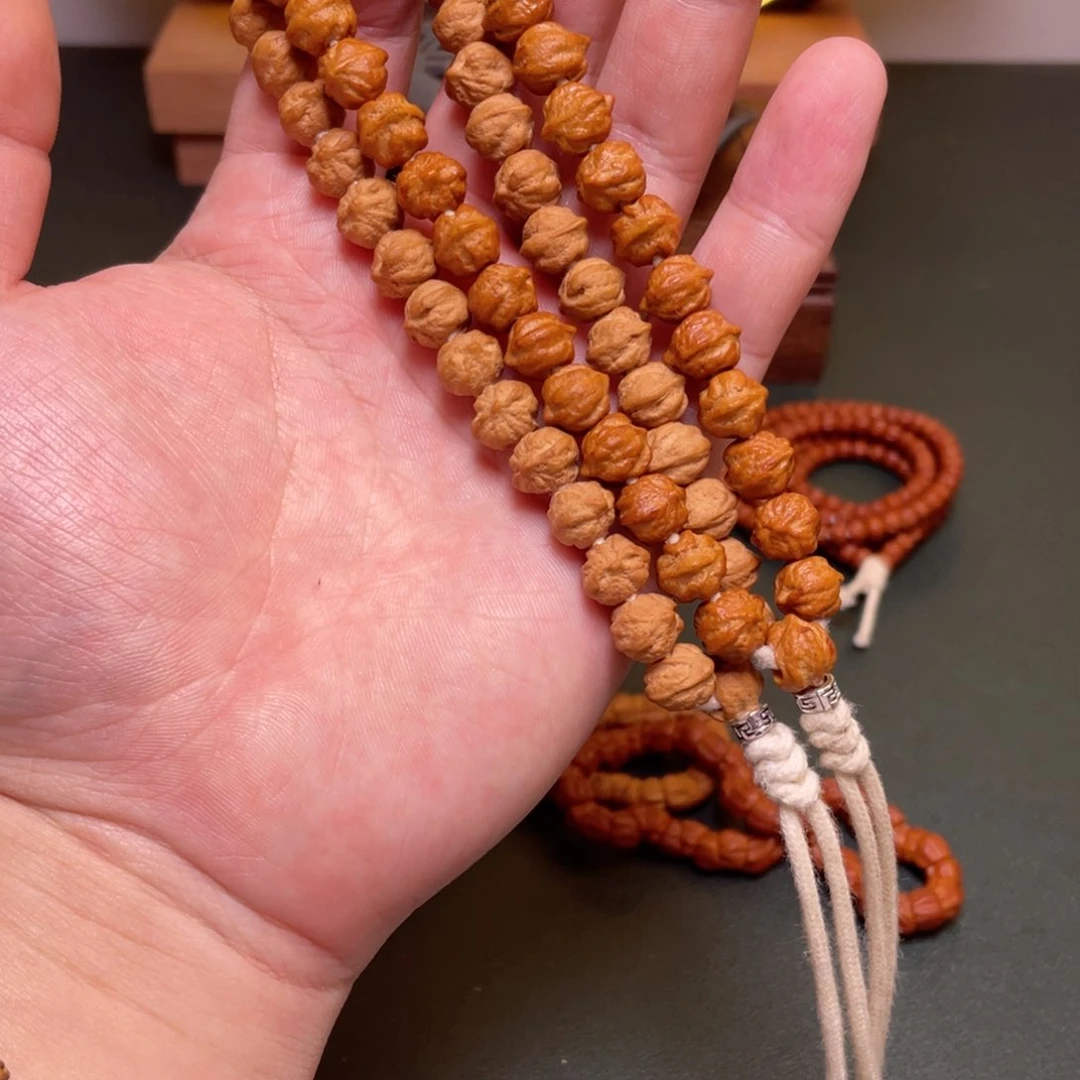 柏香籽/百香籽吊坠白牙横打手持