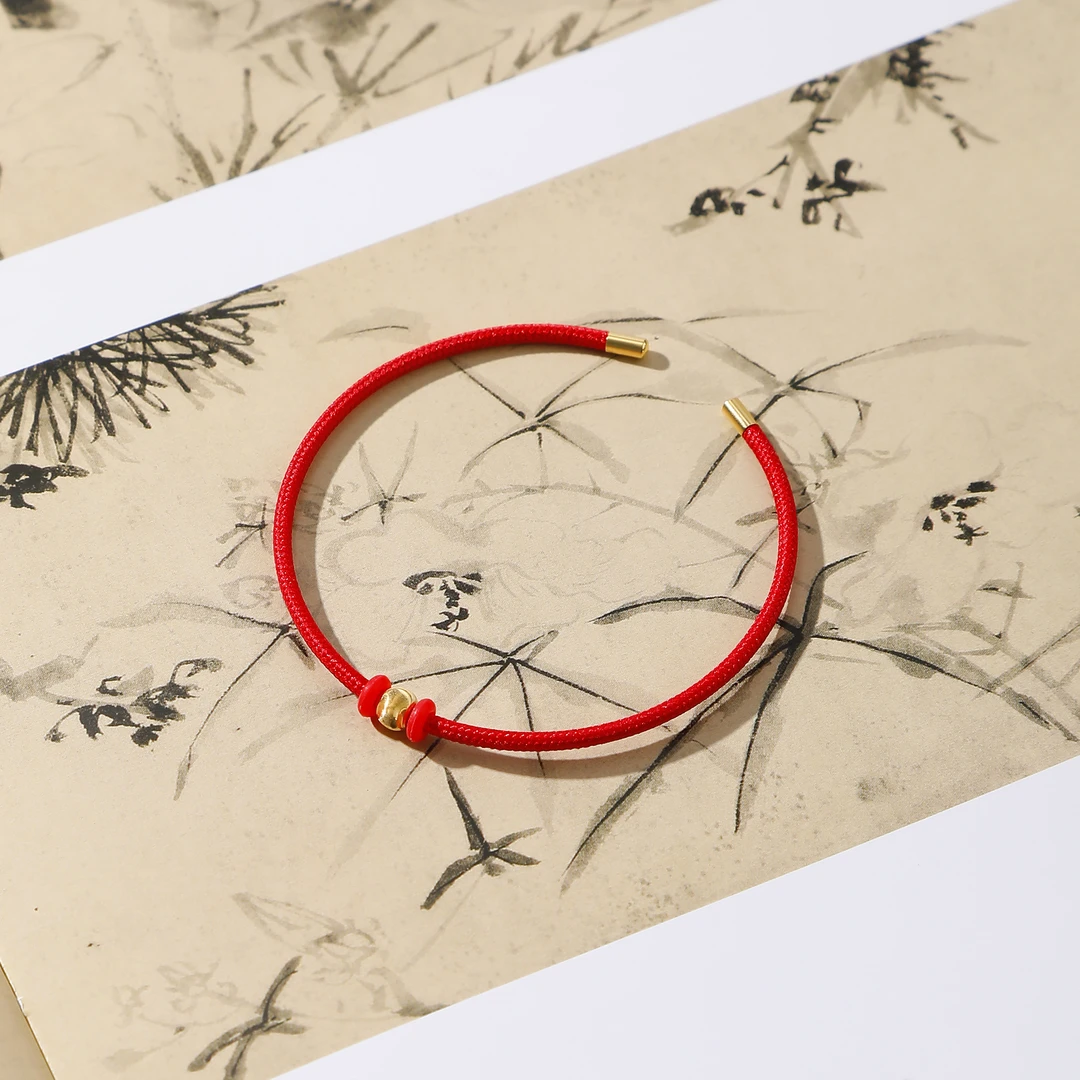 一了个卜18k猫眼珠红绳