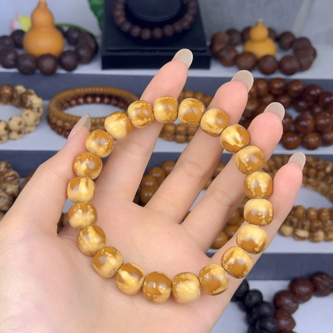 N***公紫金鼠手串花皮老型差价