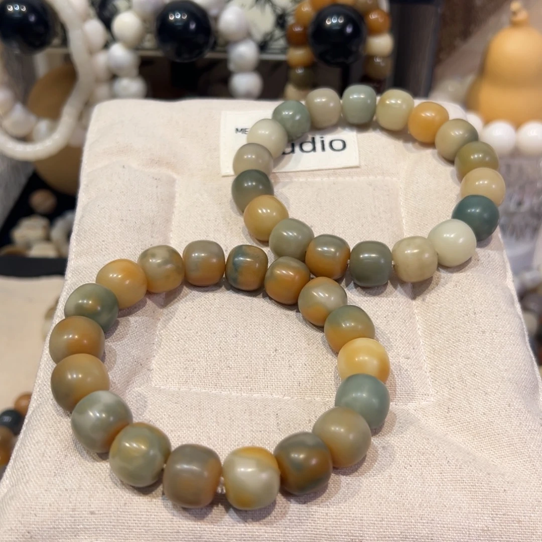 吊坠菩提根/象牙果棕青羽卡14微瑕