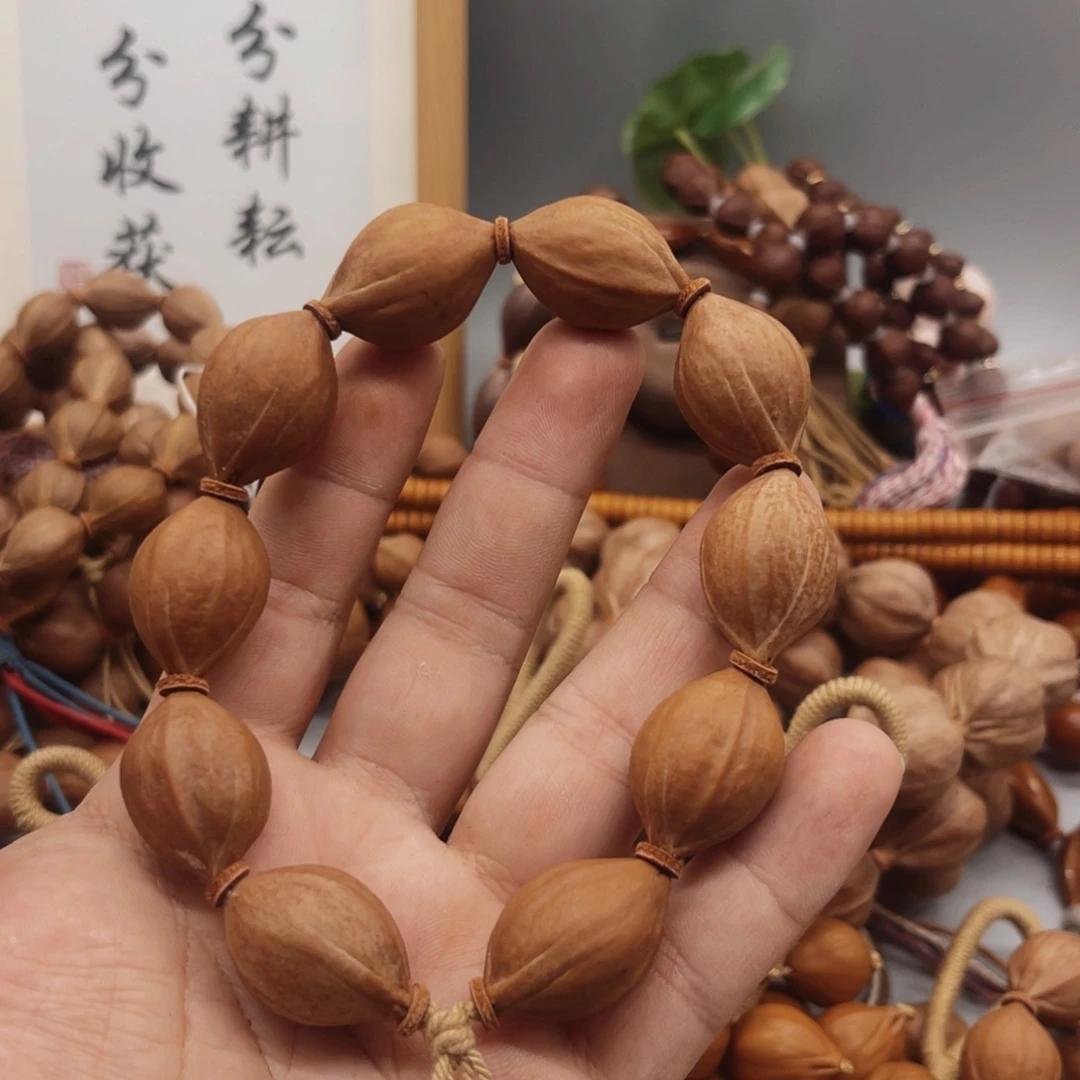 赵***黍橄榄核手串/手链三面佛