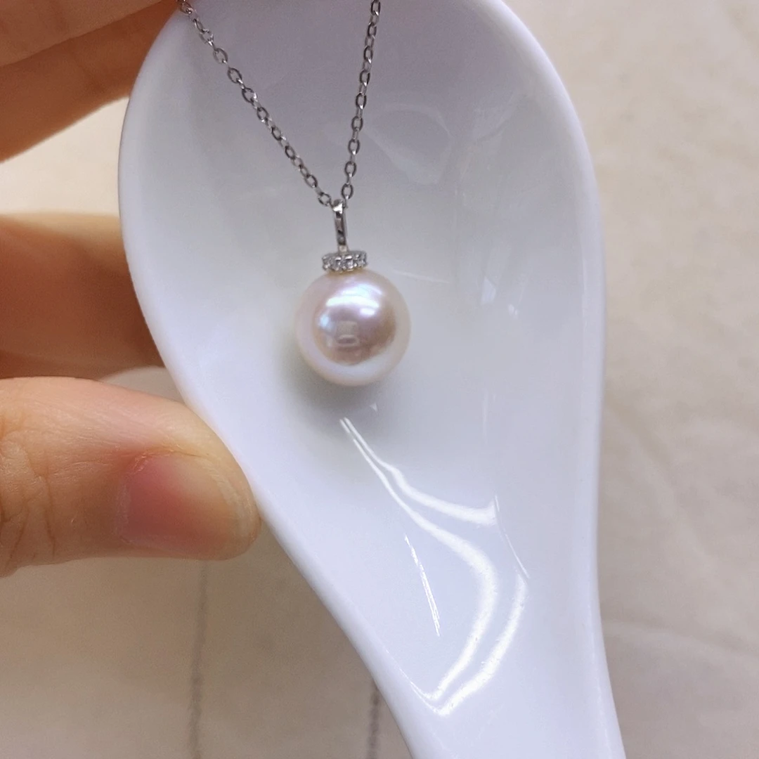 淡水珍珠银S925镶嵌吊坠(赠链)胖****娃