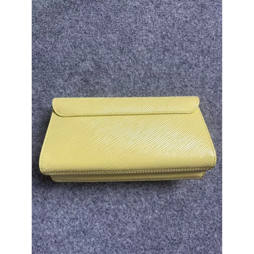 TOLEX2025新款手工时尚横扭扭百搭女包黄色