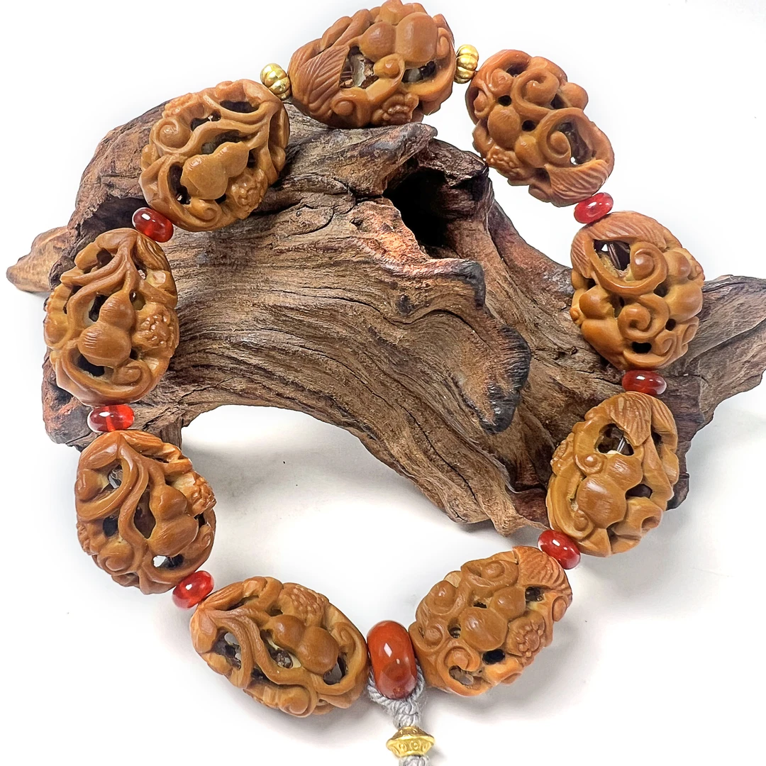 熹光精品橄榄核雕