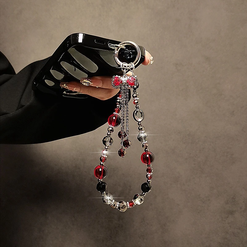 奢华高级感手机链挂件蝴蝶结流苏挂饰短款水晶适用苹果华为等手机