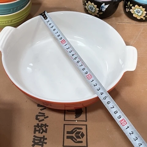 微瑕，不能明火，口径23厘米，高度5外橙内白变形