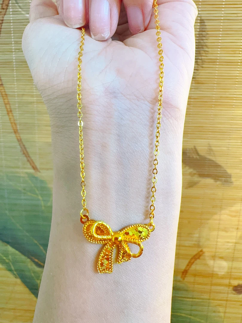精工金色蝴蝶结项链10417