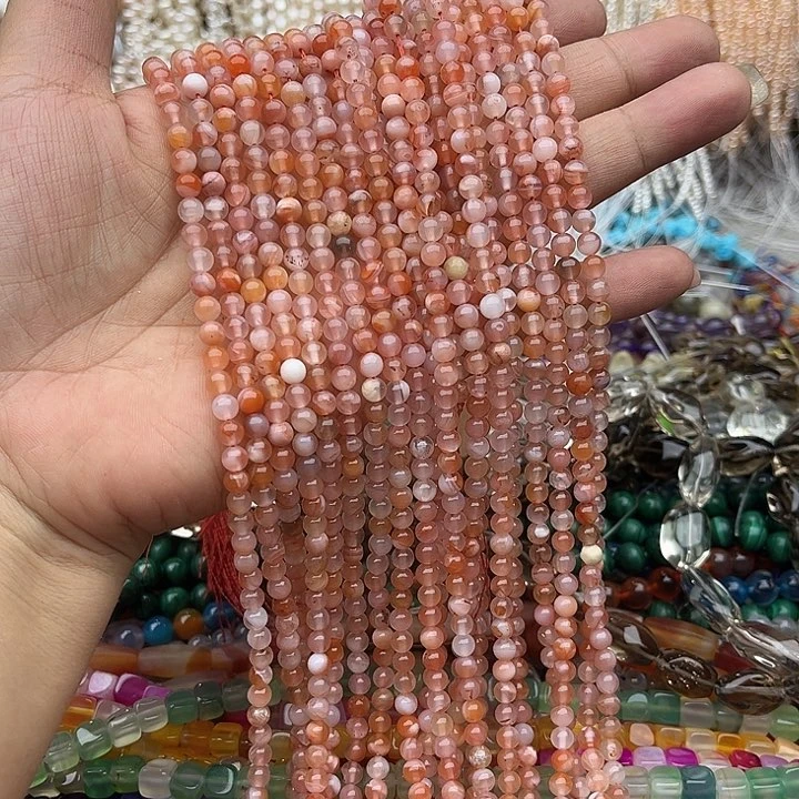 玛瑙/玉髓未镶嵌珠宝半成品一条5mm左右锦鲤飘花南红