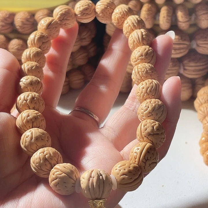 自***。桃核吊坠桃核手串肌肉18