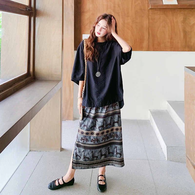 松弛慵懒风黑色半袖T恤印花半身裙两件套女2025夏季休闲洋气套装