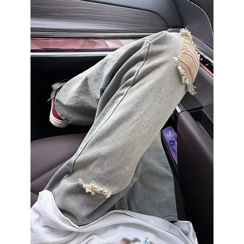 浅蓝色破洞弯刀牛仔裤男夏季薄款美式高街vibe裤子直筒修身微喇裤