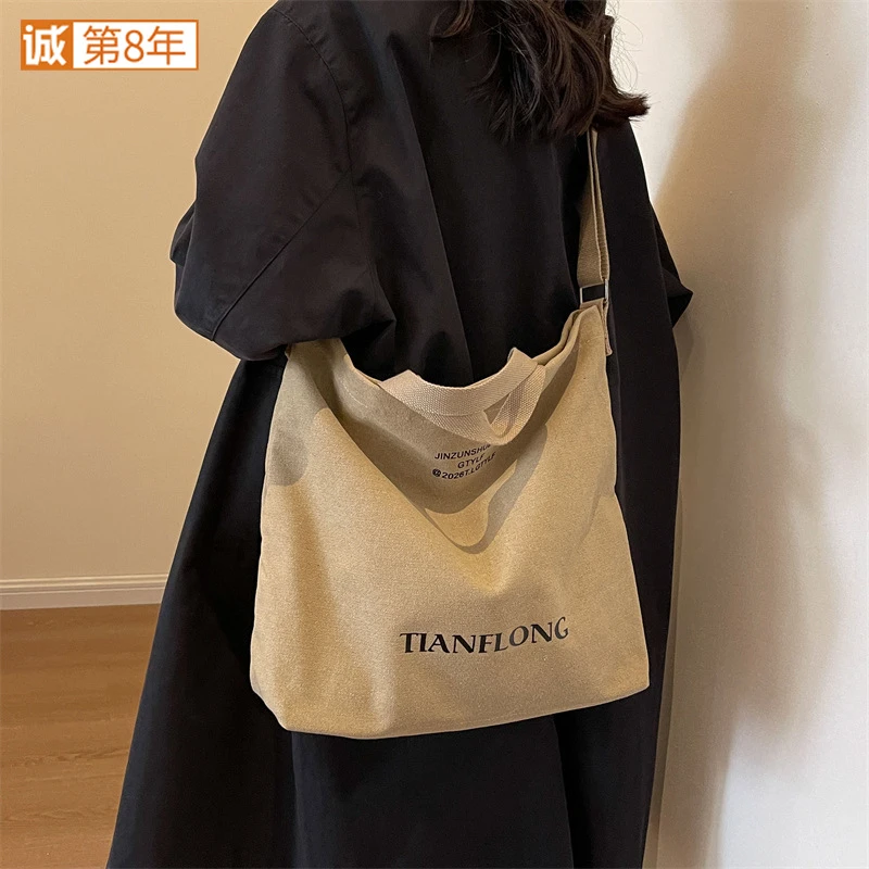 新款加厚复古水洗帆布斜挎包男通勤大学生上课包日系文艺风手提包