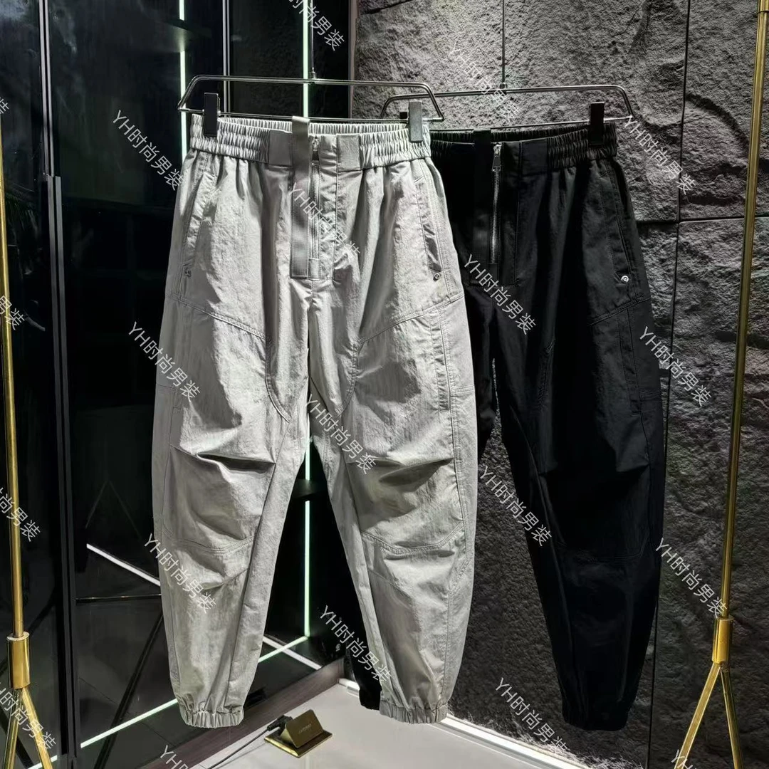 春季新款时尚潮流纯色明拉链设计立体剪裁弯刀裤宽松休闲百搭长裤